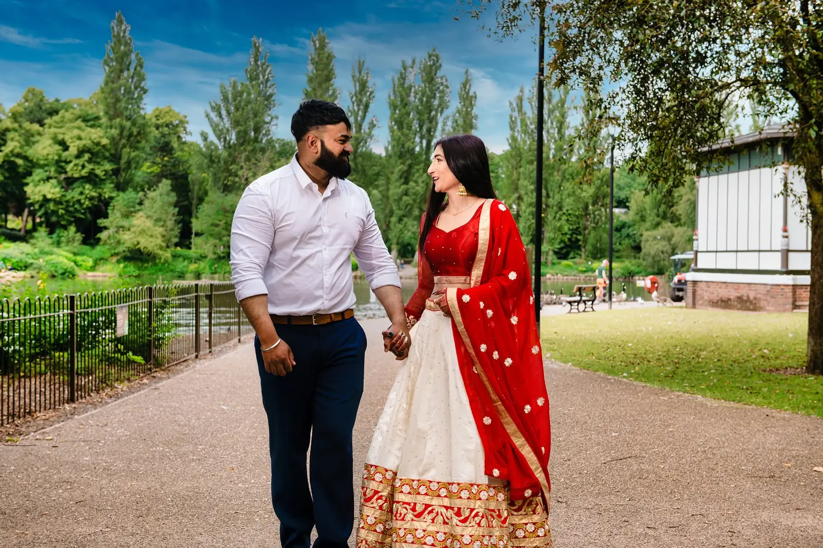 Engaged Asian couple walking together during a pre-wedding shoot